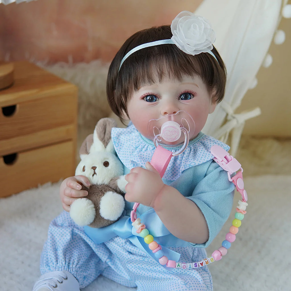 Boneca Bebê Reborn Brastoy Realista Silicone 48cm Conjunto de Roupa Chupeta Mamadeira e Pelúcia Pode Dar Banho Roupa