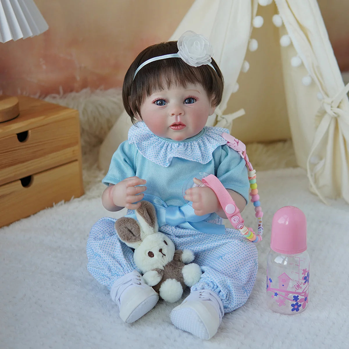 Boneca Bebê Reborn Brastoy Realista Silicone 48cm Conjunto de Roupa Chupeta Mamadeira e Pelúcia Pode Dar Banho Roupa