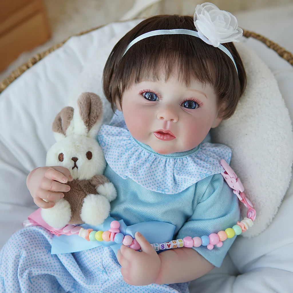 Boneca Bebê Reborn Brastoy Realista Silicone 48cm Conjunto de Roupa Chupeta Mamadeira e Pelúcia Pode Dar Banho Roupa