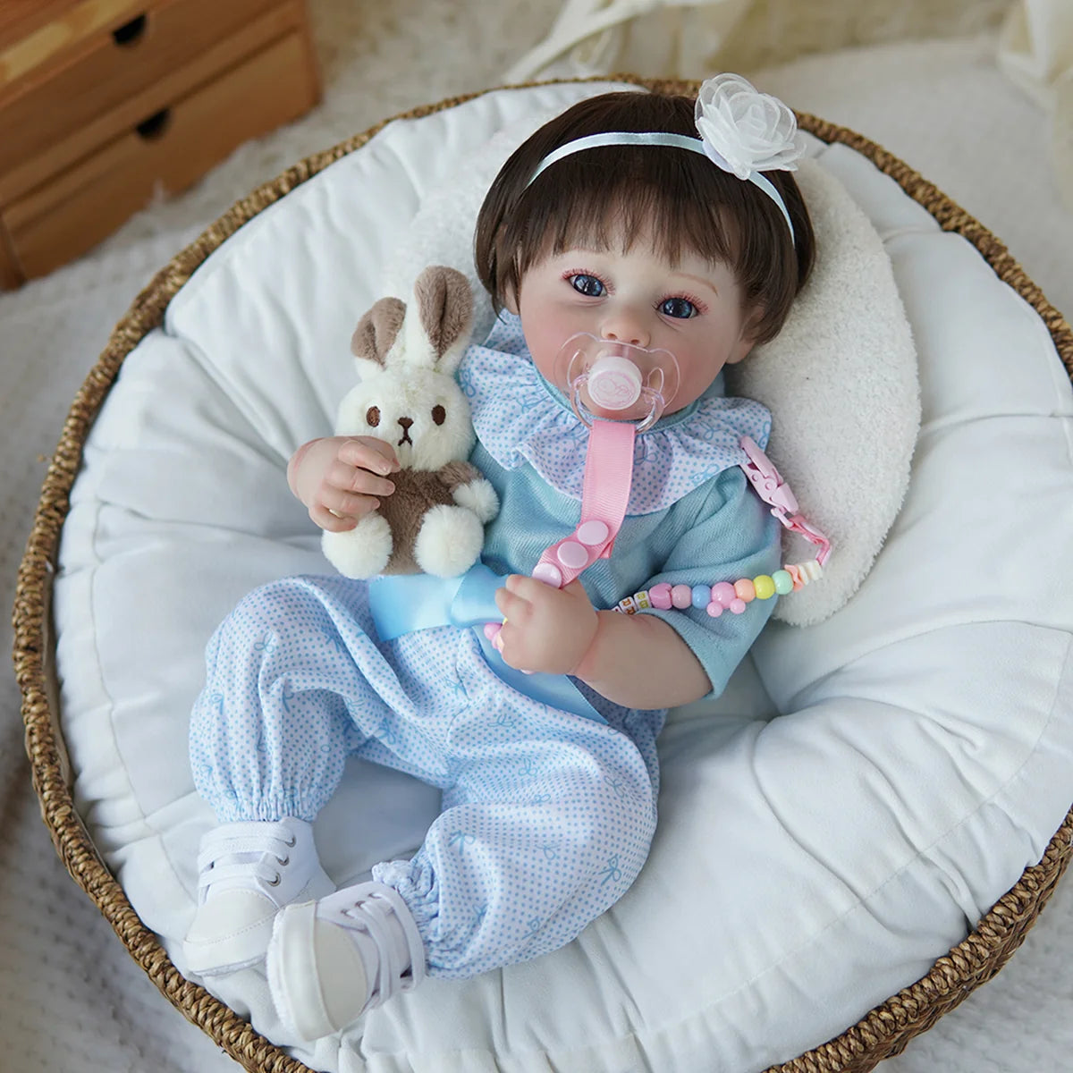Boneca Bebê Reborn Brastoy Realista Silicone 48cm Conjunto de Roupa Chupeta Mamadeira e Pelúcia Pode Dar Banho Roupa