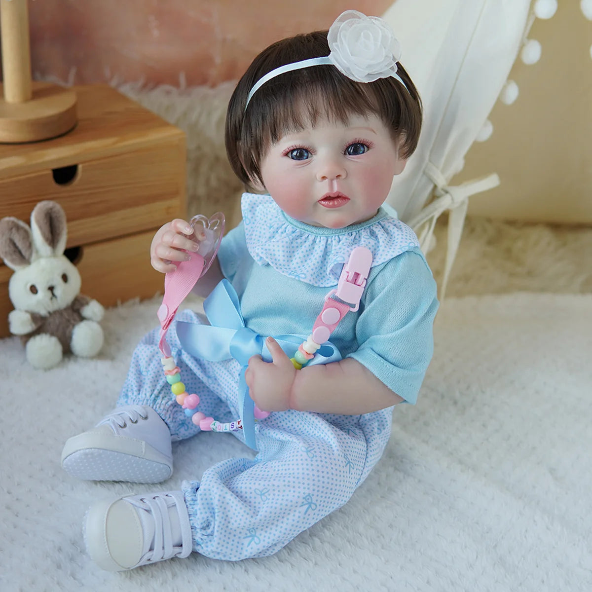 Boneca Bebê Reborn Brastoy Realista Silicone 48cm Conjunto de Roupa Chupeta Mamadeira e Pelúcia Pode Dar Banho Roupa