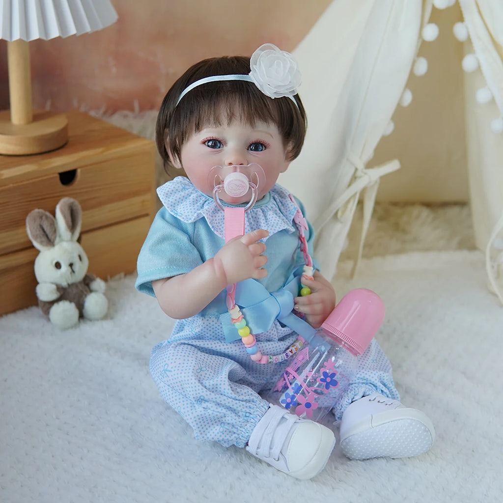 Boneca Bebê Reborn Brastoy Realista Silicone 48cm Conjunto de Roupa Chupeta Mamadeira e Pelúcia Pode Dar Banho Roupa