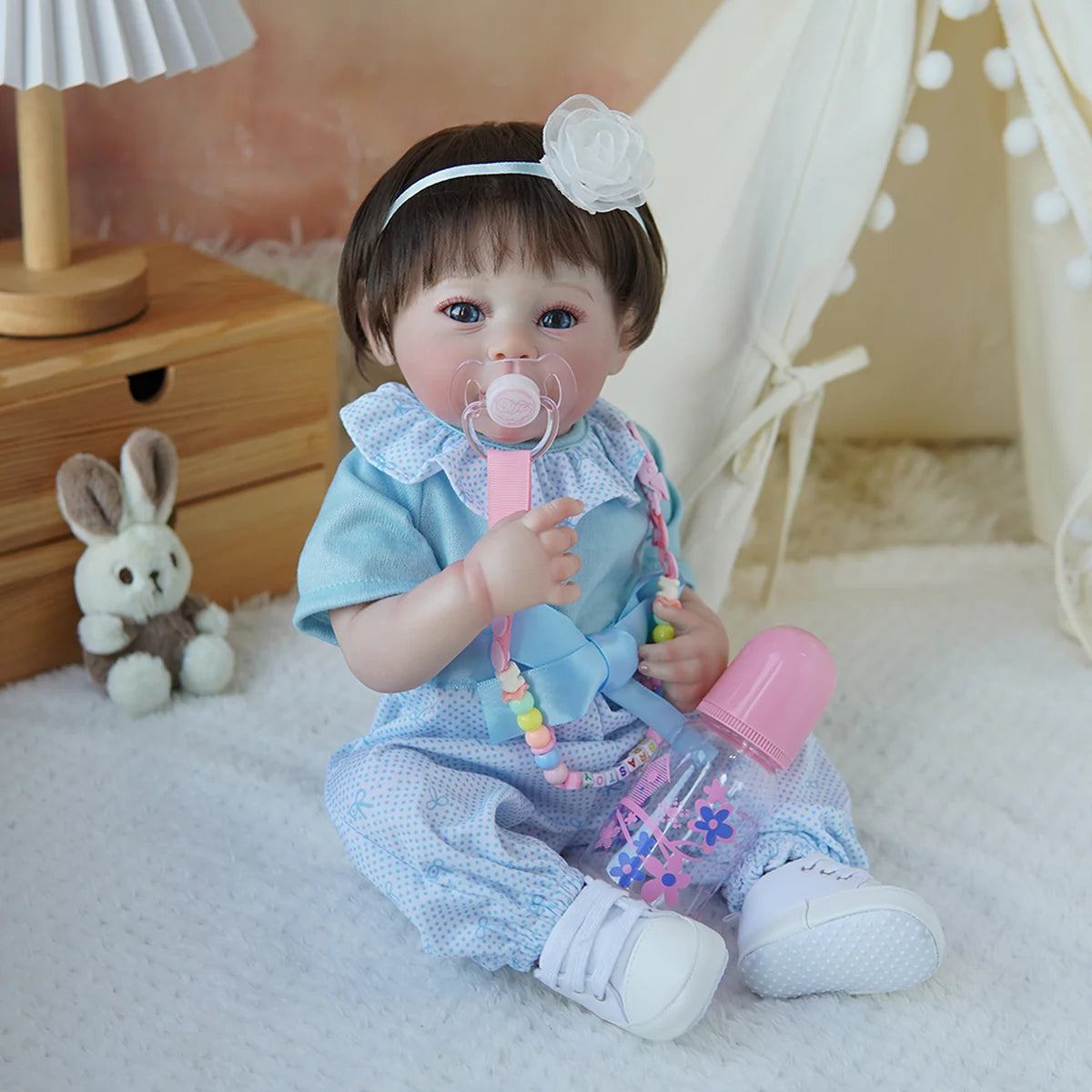 Boneca Bebê Reborn Brastoy Realista Silicone 48cm Conjunto de Roupa Chupeta Mamadeira e Pelúcia Pode Dar Banho Roupa