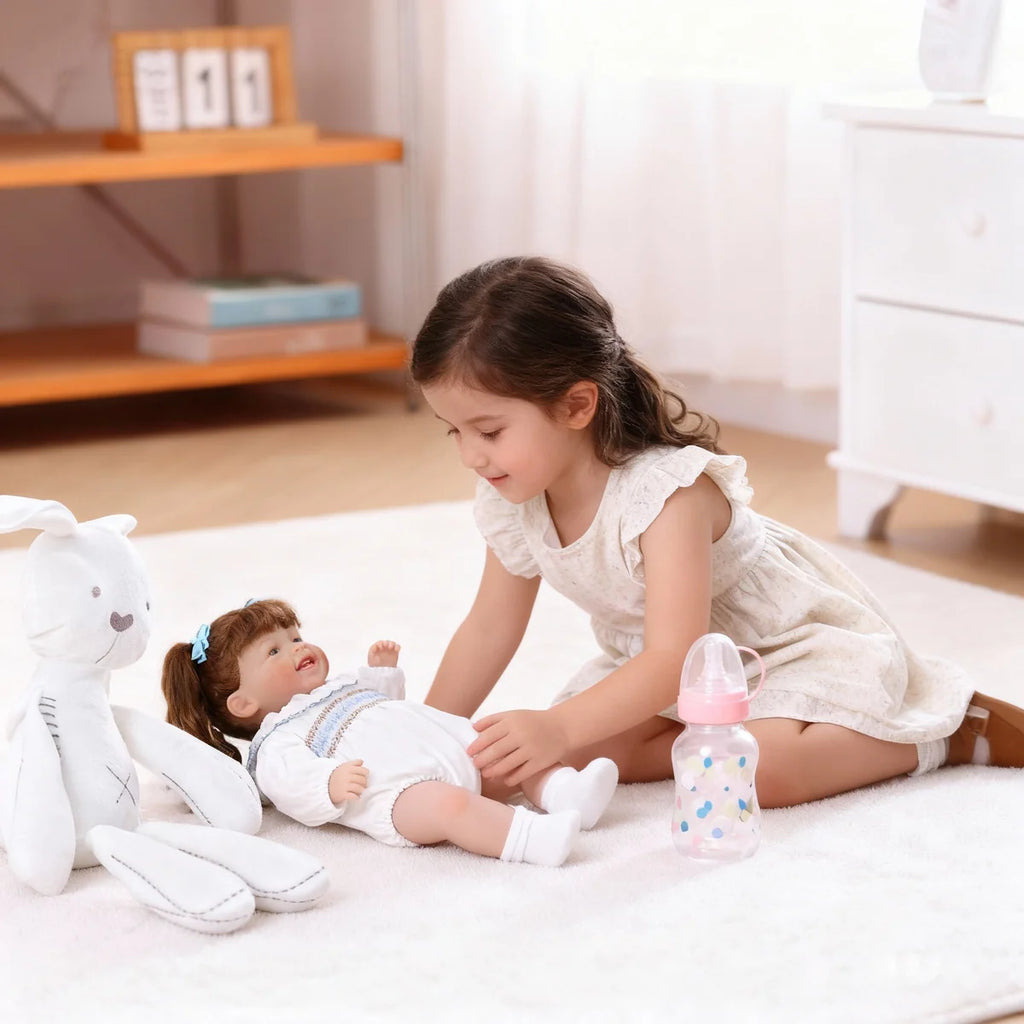 Boneca Bebê Reborn Brastoy Realista 60cm Silicone Conjunto de Roupa Chupeta Mamadeira Fralda Certidão e Pelúcia