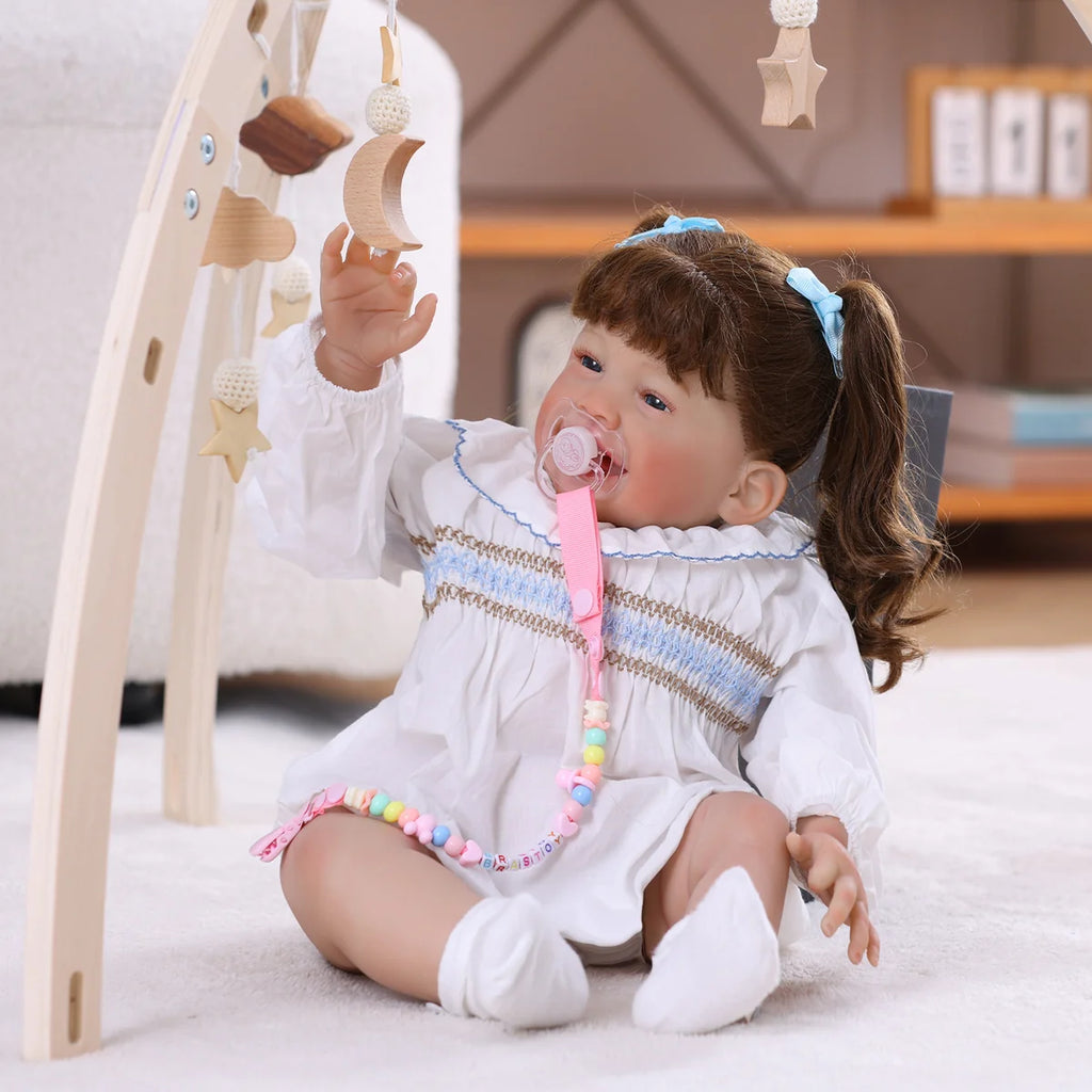 Boneca Bebê Reborn Brastoy Realista 60cm Silicone Conjunto de Roupa Chupeta Mamadeira Fralda Certidão e Pelúcia