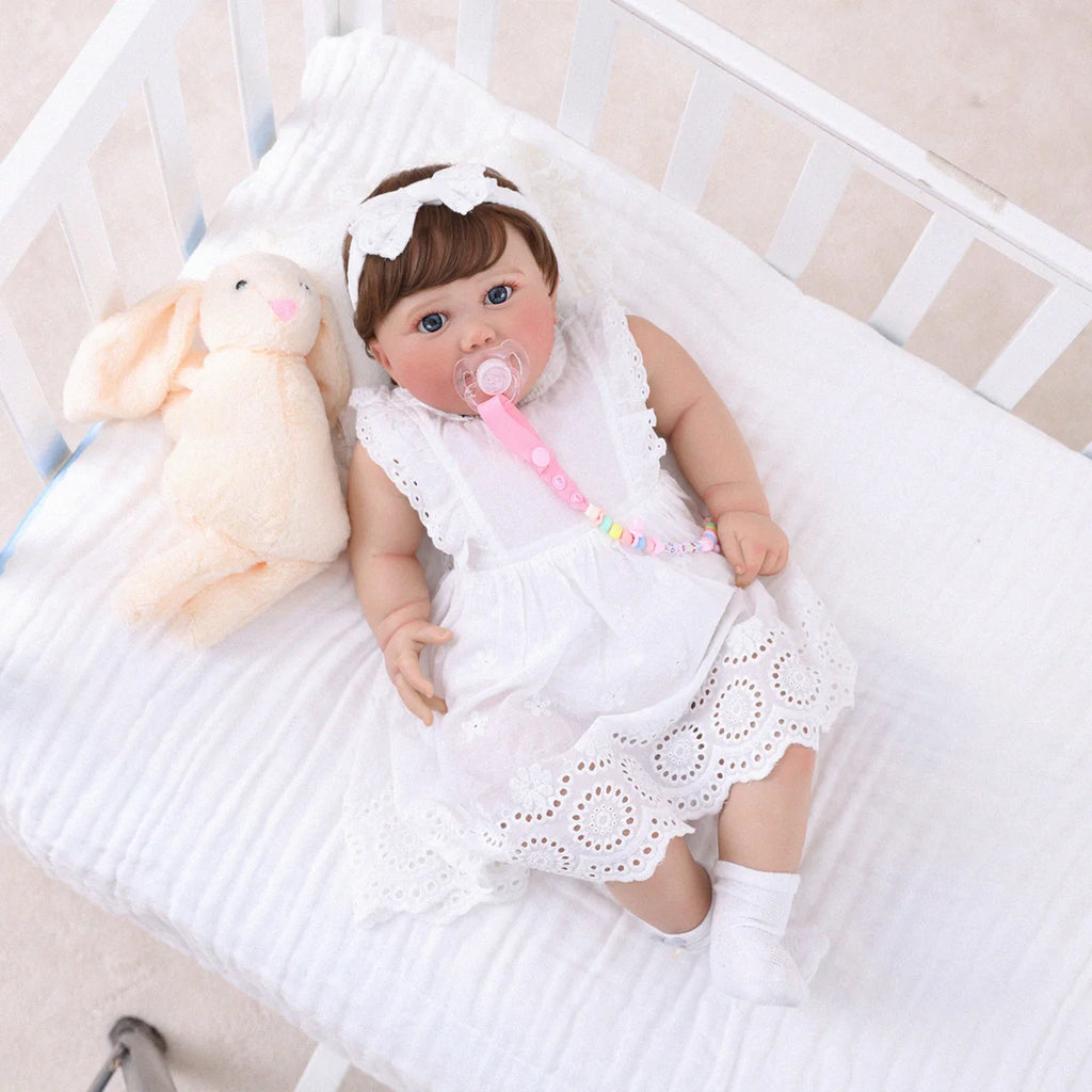 Boneca Bebê Reborn Brastoy Realista 60cm Silicone Conjunto de Roupa Chupeta Mamadeira Fralda Certidão e Pelúcia