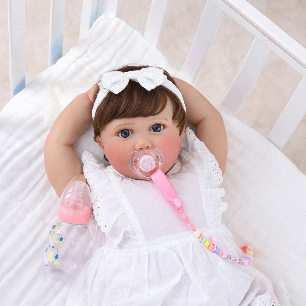 Boneca Bebê Reborn Brastoy Realista 60cm Silicone Conjunto de Roupa Chupeta Mamadeira Fralda Certidão e Pelúcia