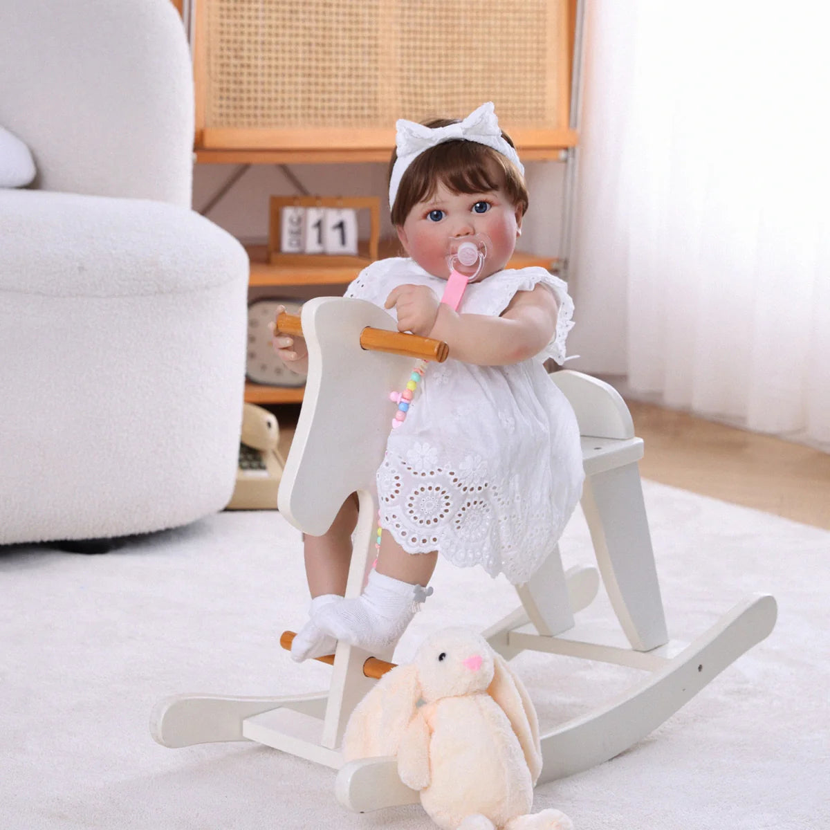 Boneca Bebê Reborn Brastoy Realista 60cm Silicone Conjunto de Roupa Chupeta Mamadeira Fralda Certidão e Pelúcia
