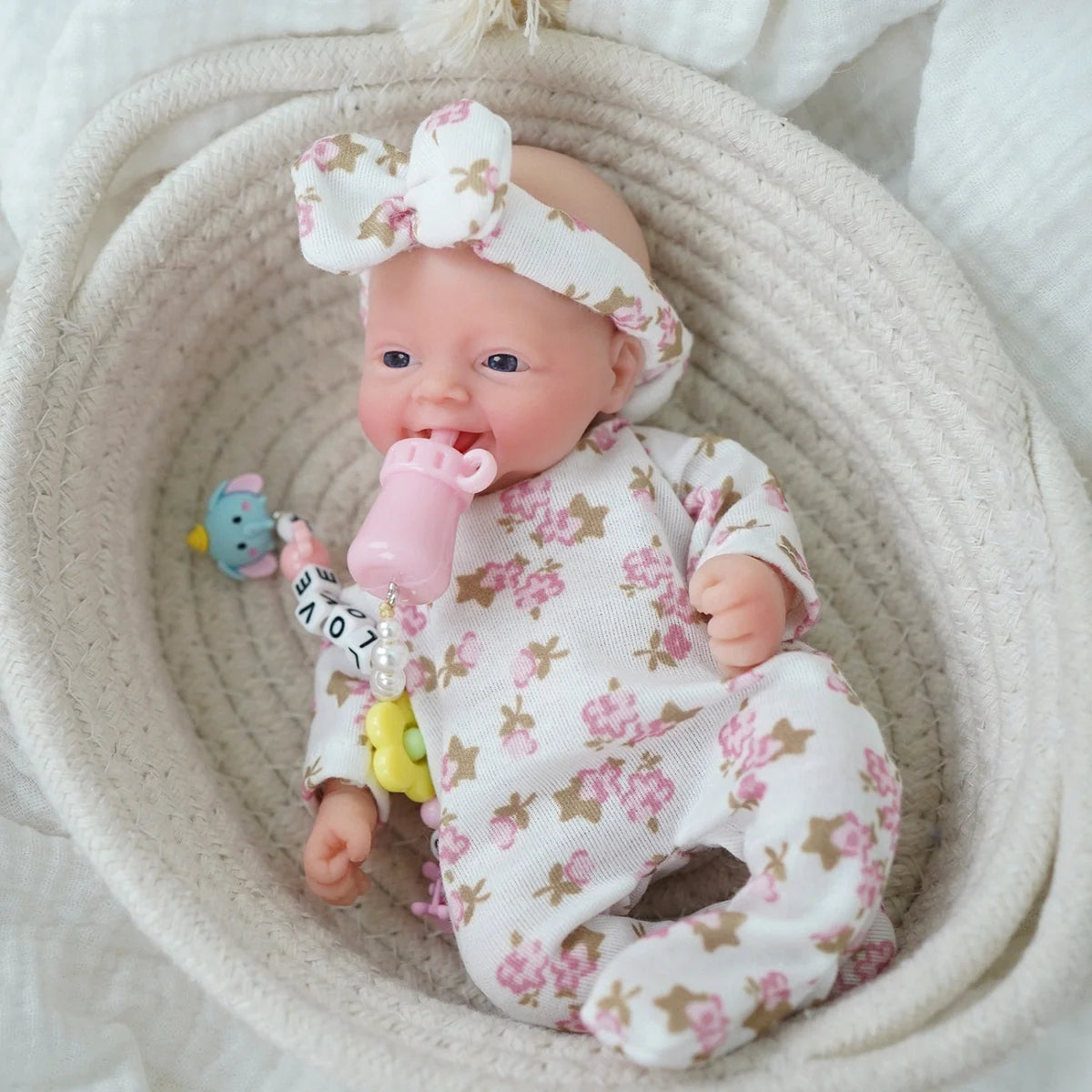 Boneca Bebê Reborn Silicone Sólido 20cm Menina Olho Azul