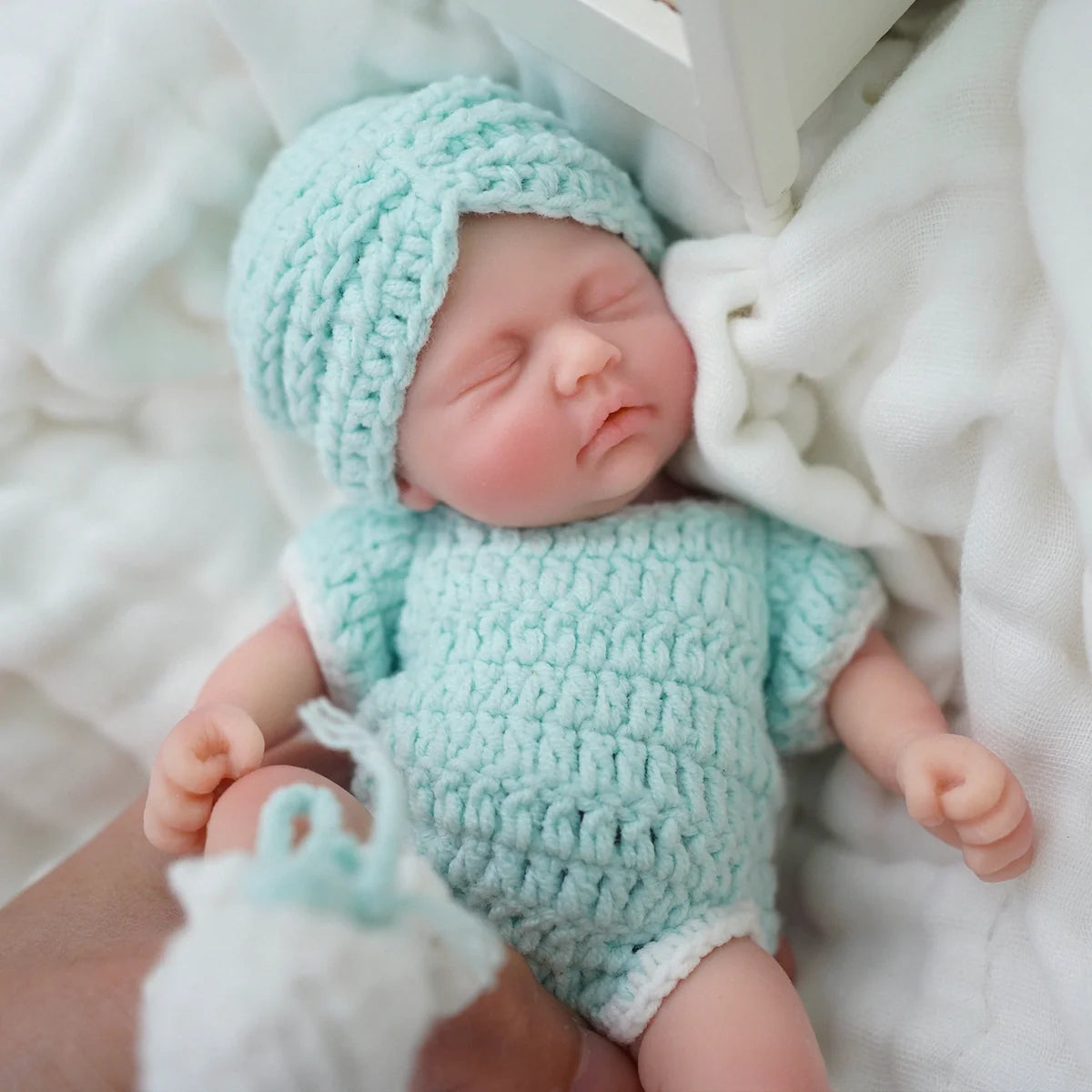 Boneca Bebê Reborn Brastoy Realista Silicone 20cm Conjunto de Roupa Mamadeira e Pelúcia Pode Dar Banho Roupa