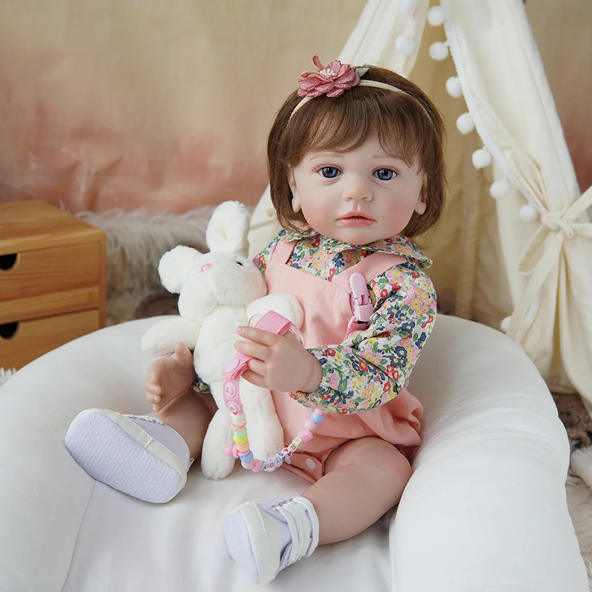 Boneca Bebê Reborn Brastoy Realista Silicone 55cm Conjunto de Roupa Chupeta Mamadeira e Pelúcia Pode Dar Banho Roupa