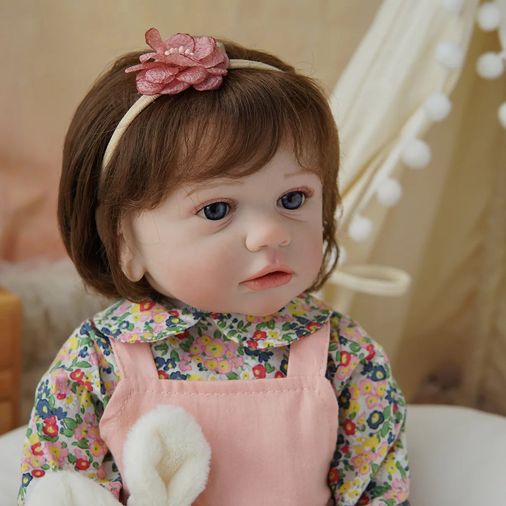 Boneca Bebê Reborn Brastoy Realista Silicone 55cm Conjunto de Roupa Chupeta Mamadeira e Pelúcia Pode Dar Banho Roupa