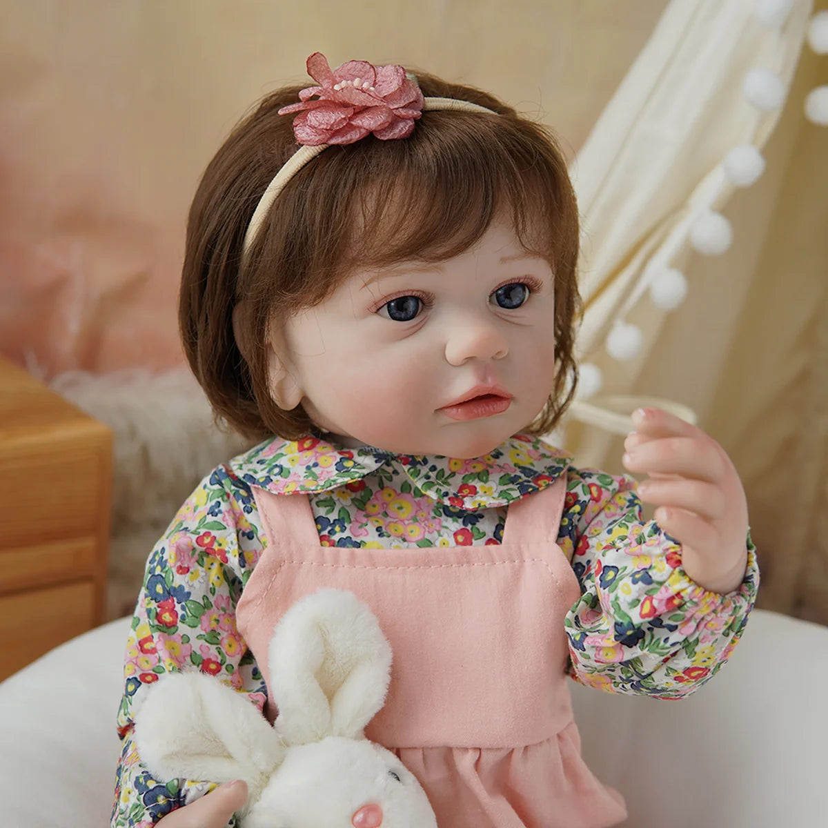 Boneca Bebê Reborn Brastoy Realista Silicone 55cm Conjunto de Roupa Chupeta Mamadeira e Pelúcia Pode Dar Banho Roupa