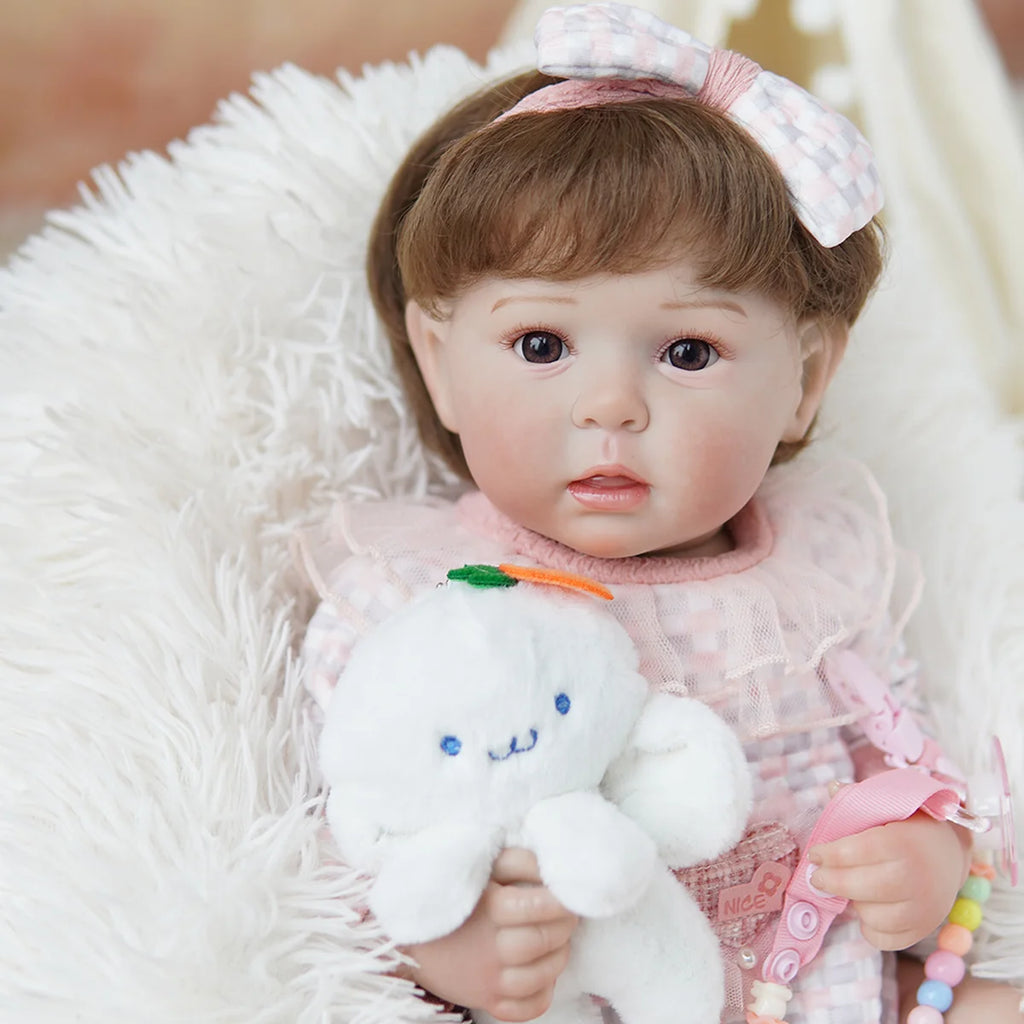 Boneca Bebê Reborn Brastoy Realista Silicone 48cm Conjunto de Roupa Chupeta Mamadeira e Pelúcia Pode Dar Banho Roupa