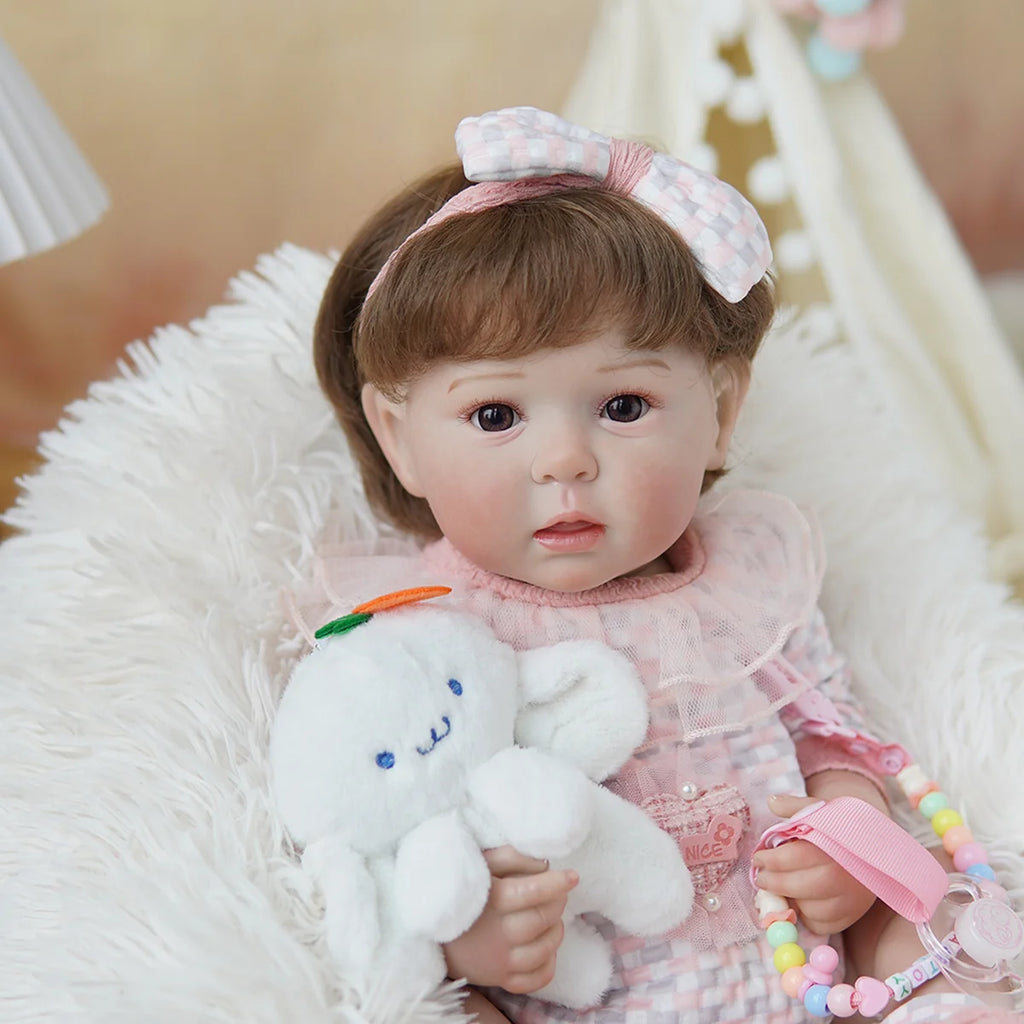 Boneca Bebê Reborn Brastoy Realista Silicone 48cm Conjunto de Roupa Chupeta Mamadeira e Pelúcia Pode Dar Banho Roupa