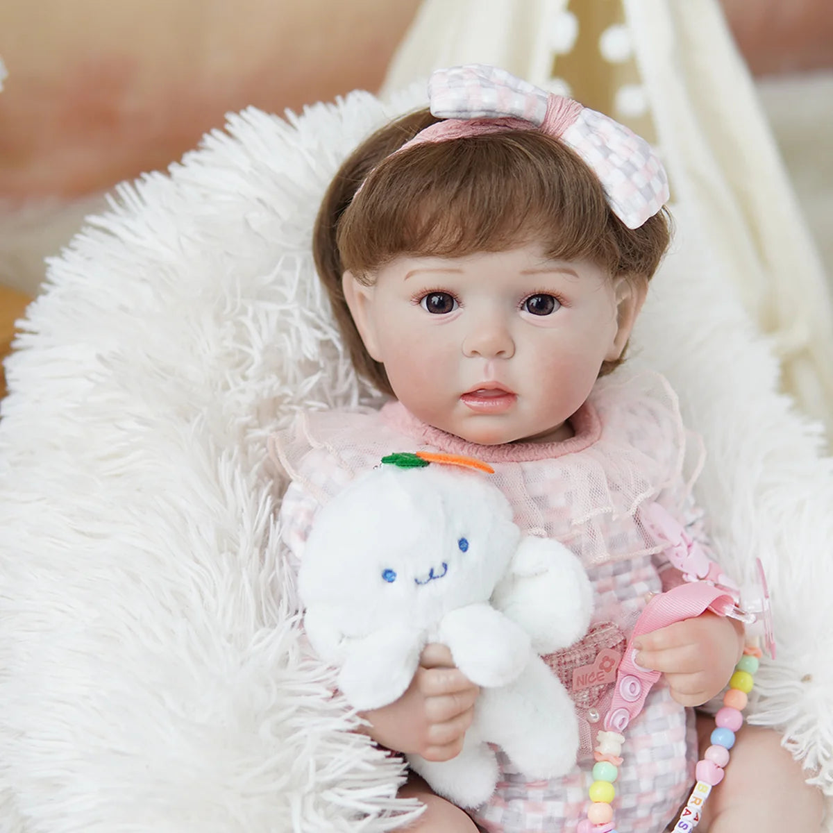 Boneca Bebê Reborn Brastoy Realista Silicone 48cm Conjunto de Roupa Chupeta Mamadeira e Pelúcia Pode Dar Banho Roupa