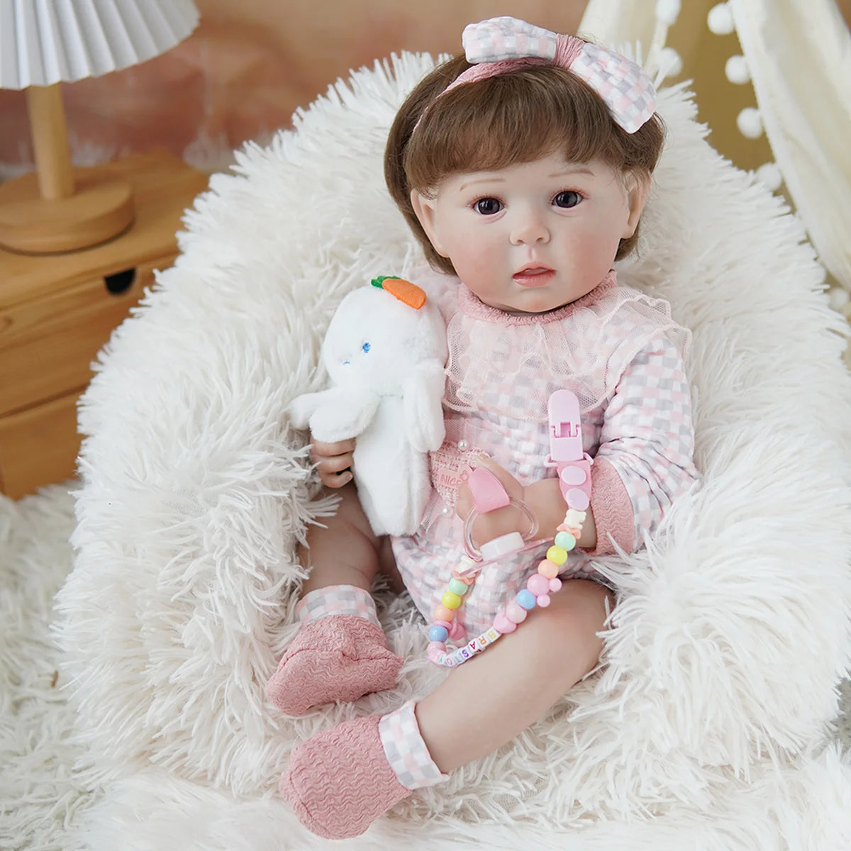 Boneca Bebê Reborn Brastoy Realista Silicone 48cm Conjunto de Roupa Chupeta Mamadeira e Pelúcia Pode Dar Banho Roupa