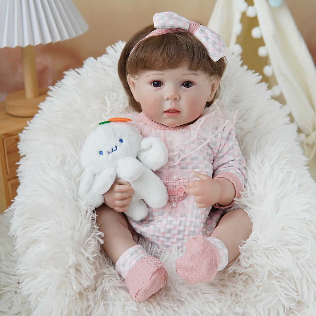 Boneca Bebê Reborn Brastoy Realista Silicone 48cm Conjunto de Roupa Chupeta Mamadeira e Pelúcia Pode Dar Banho Roupa