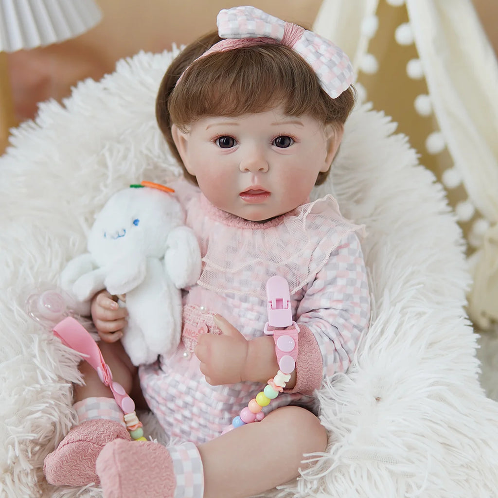 Boneca Bebê Reborn Brastoy Realista Silicone 48cm Conjunto de Roupa Chupeta Mamadeira e Pelúcia Pode Dar Banho Roupa