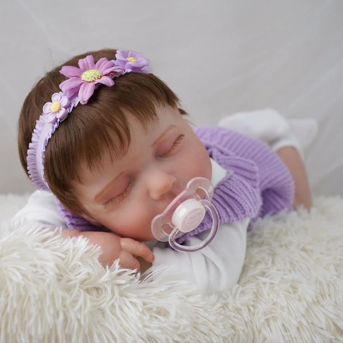 Boneca Bebê Reborn Brastoy Realista Silicone 48cm Conjunto de Roupa Chupeta Mamadeira e Pelúcia Pode Dar Banho Roupa
