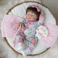 Boneca Bebê Reborn Brastoy Realista Silicone 48cm Conjunto de Roupa Chupeta Mamadeira e Pelúcia Pode Dar Banho Roupa