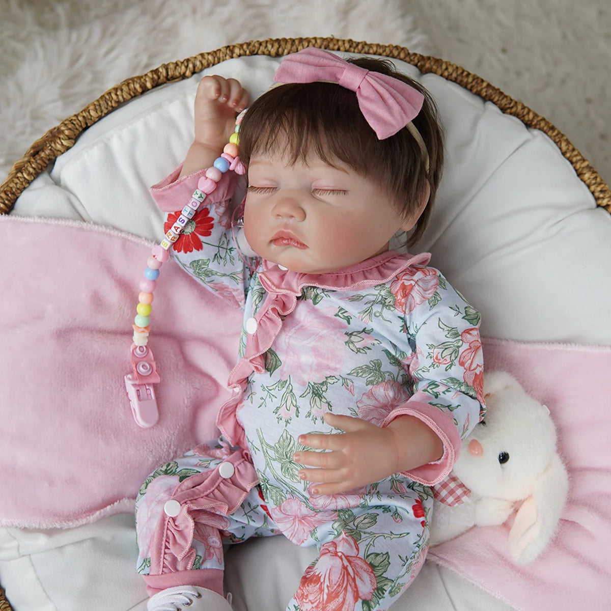 Boneca Bebê Reborn Brastoy Realista Silicone 48cm Conjunto de Roupa Chupeta Mamadeira e Pelúcia Pode Dar Banho Roupa
