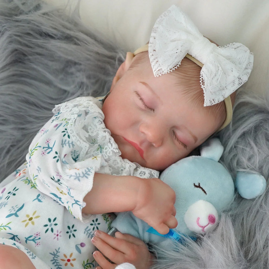 Boneca Bebê Reborn Brastoy Realista Silicone 48cm Conjunto de Roupa Chupeta Mamadeira e Pelúcia Pode Dar Banho Roupa