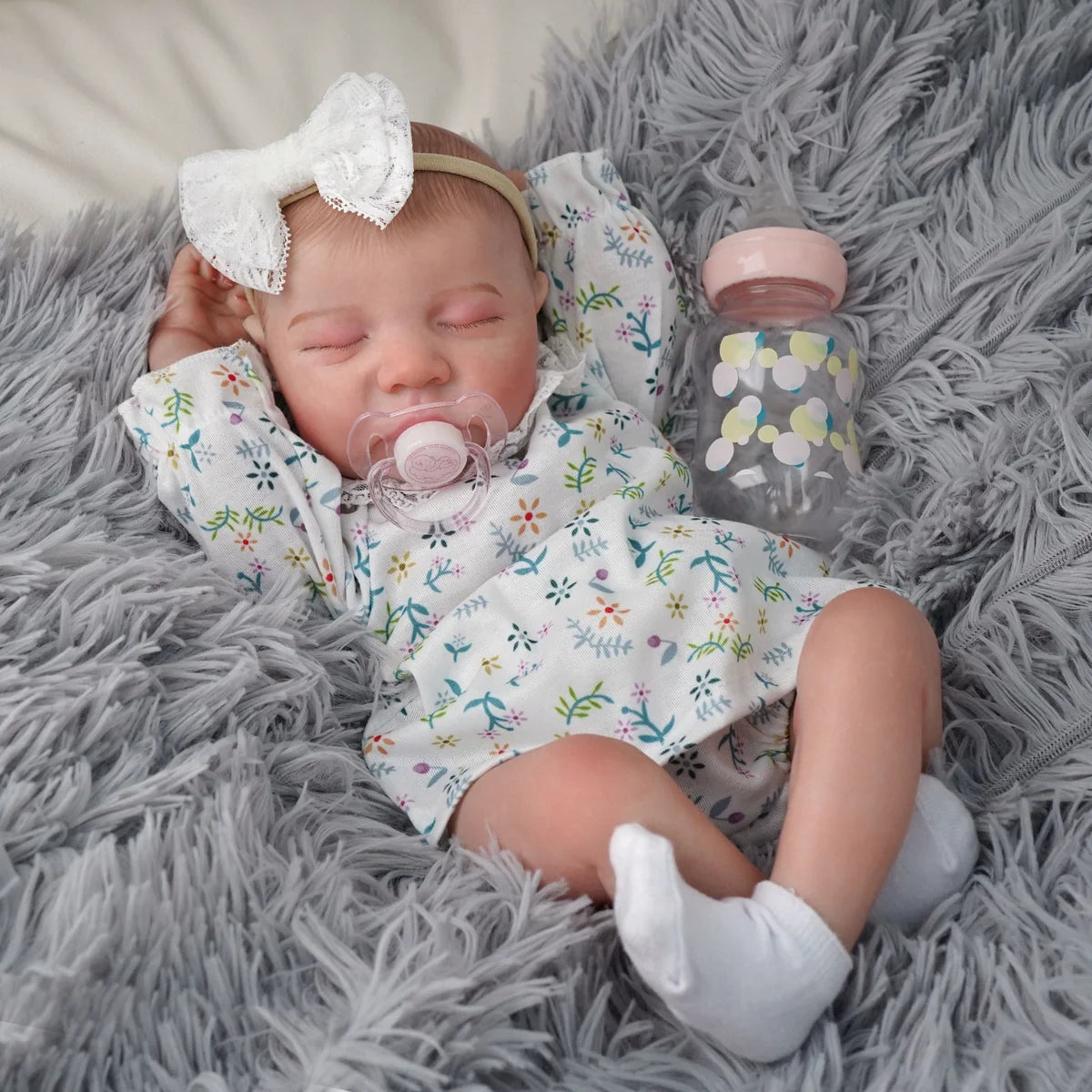 Boneca Bebê Reborn Brastoy Realista Silicone 48cm Conjunto de Roupa Chupeta Mamadeira e Pelúcia Pode Dar Banho Roupa