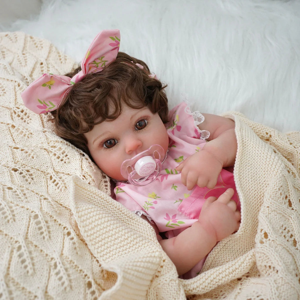 Boneca Bebê Reborn Brastoy Realista Silicone 48cm Conjunto de Roupa Chupeta Mamadeira e Pelúcia Pode Dar Banho Roupa