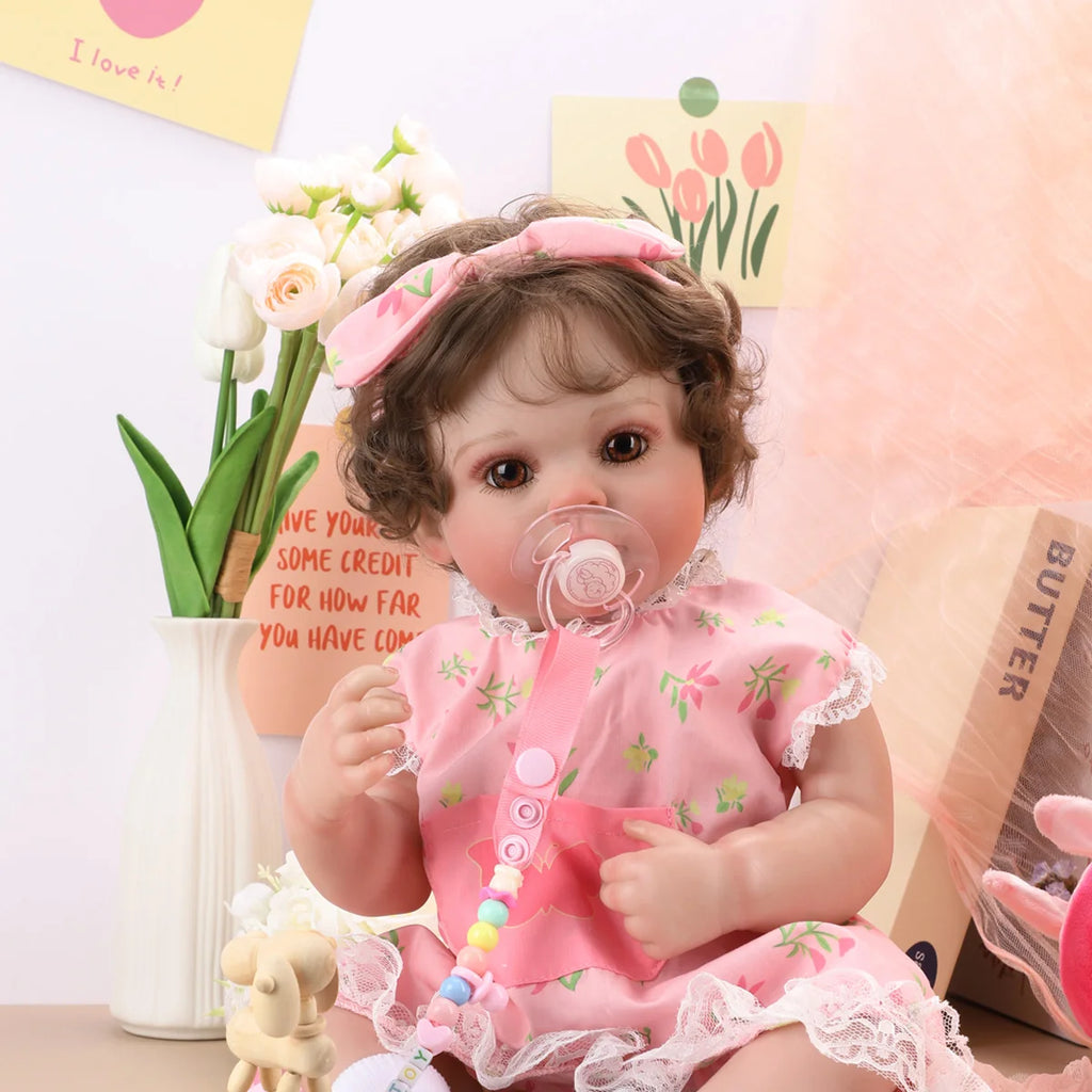 Boneca Bebê Reborn Brastoy Realista Silicone 48cm Conjunto de Roupa Chupeta Mamadeira e Pelúcia Pode Dar Banho Roupa