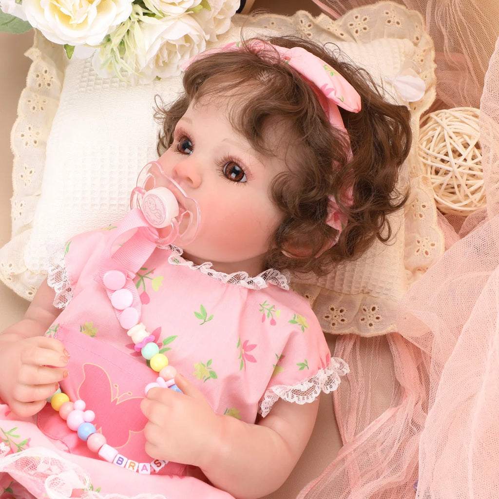 Boneca Bebê Reborn Brastoy Realista Silicone 48cm Conjunto de Roupa Chupeta Mamadeira e Pelúcia Pode Dar Banho Roupa