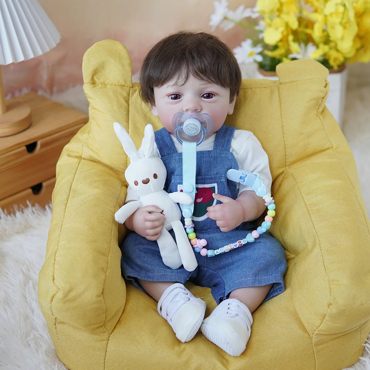 Boneco Bebê Reborn Brastoy Realista Silicone 48cm Conjunto de Roupa Chupeta Mamadeira e Pelúcia Pode Dar Banho Roupa