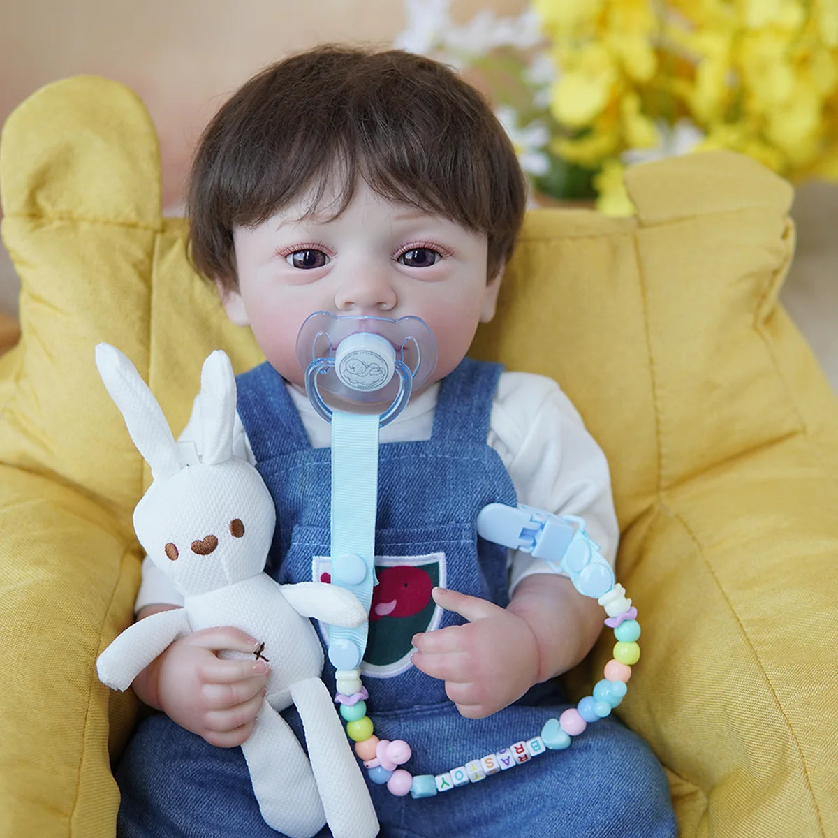 Boneco Bebê Reborn Brastoy Realista Silicone 48cm Conjunto de Roupa Chupeta Mamadeira e Pelúcia Pode Dar Banho Roupa