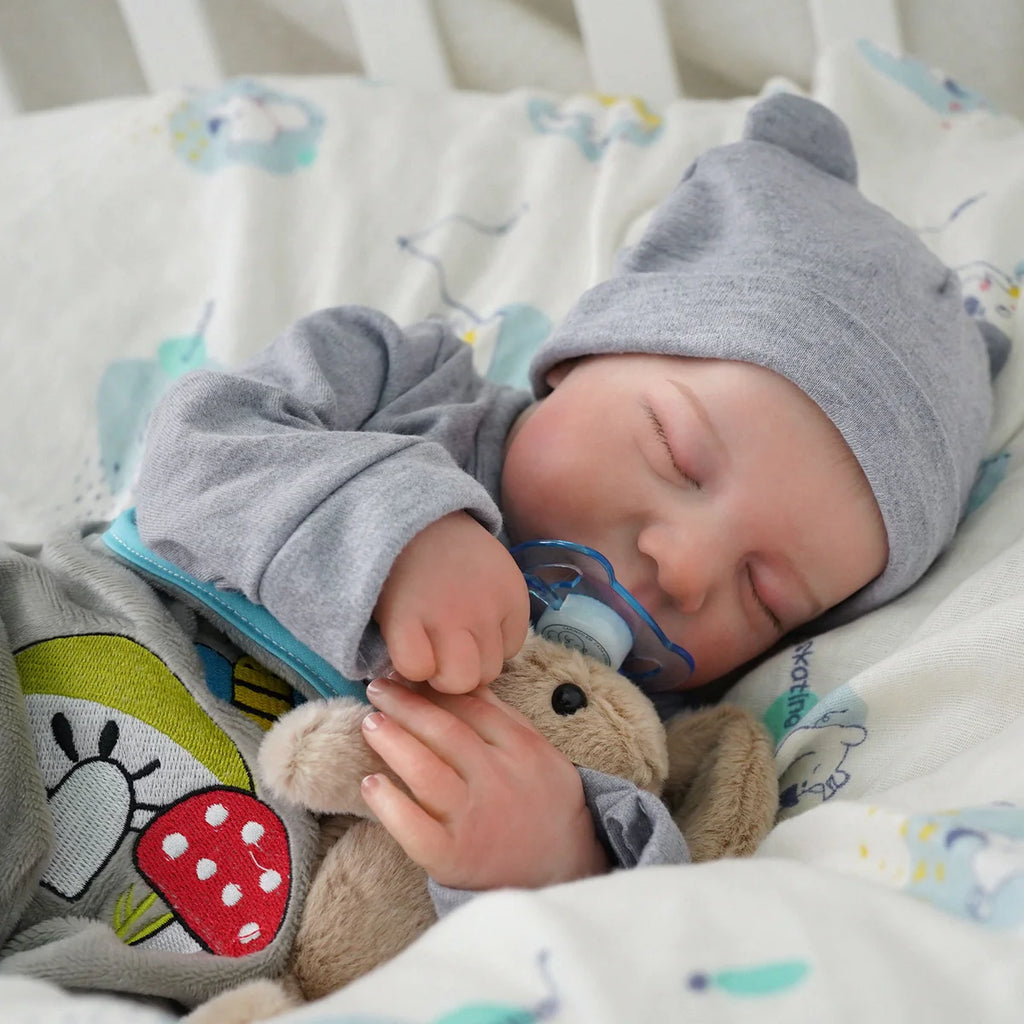 Boneco Bebê Reborn Brastoy Realista Silicone 48cm Conjunto de Roupa Chupeta Mamadeira e Pelúcia Pode Dar Banho Roupa
