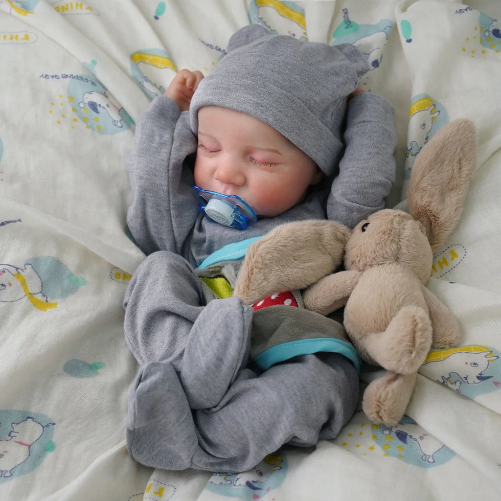 Boneco Bebê Reborn Brastoy Realista Silicone 48cm Conjunto de Roupa Chupeta Mamadeira e Pelúcia Pode Dar Banho Roupa