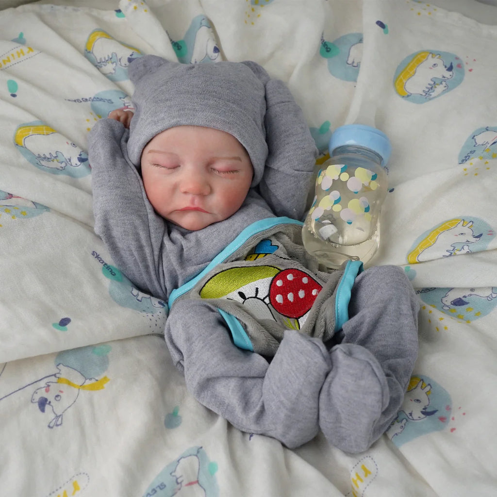 Boneco Bebê Reborn Brastoy Realista Silicone 48cm Conjunto de Roupa Chupeta Mamadeira e Pelúcia Pode Dar Banho Roupa