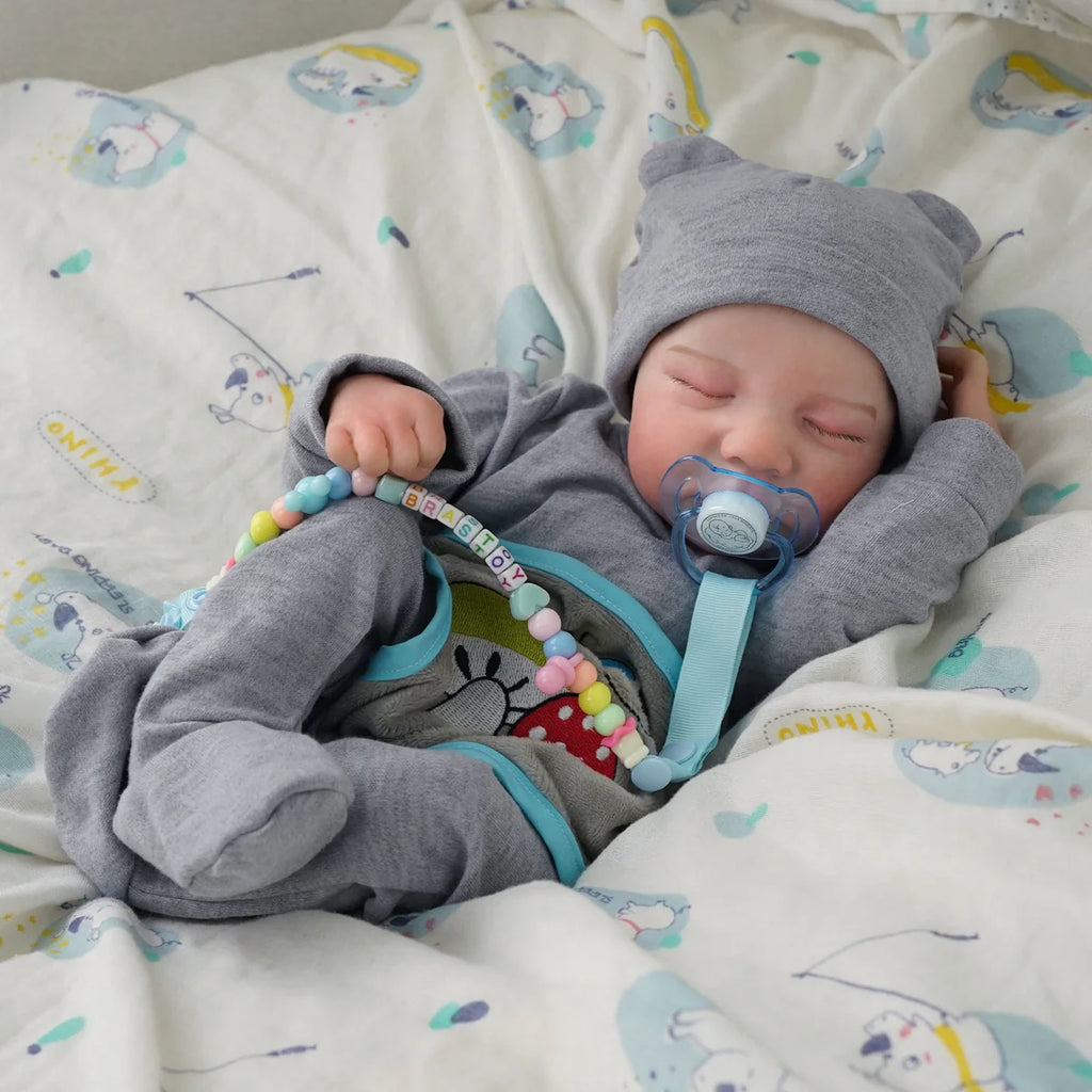 Boneco Bebê Reborn Brastoy Realista Silicone 48cm Conjunto de Roupa Chupeta Mamadeira e Pelúcia Pode Dar Banho Roupa