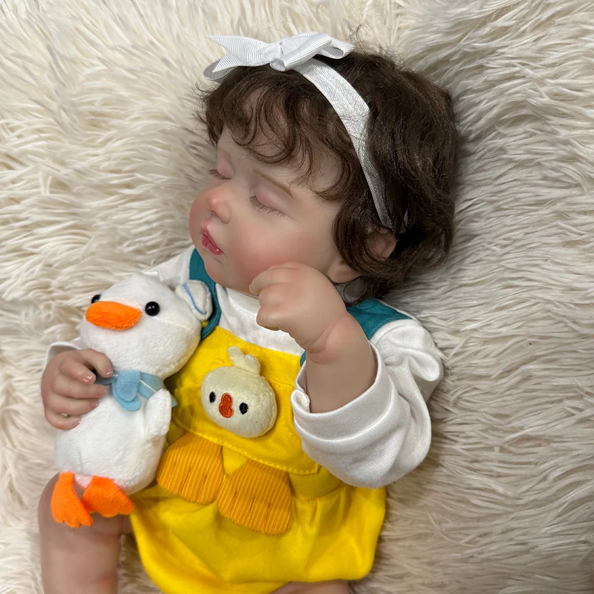 Boneca Bebê Reborn Silicone Realista 48cm Menina Olho fechado Pode dar Banho Brastoy