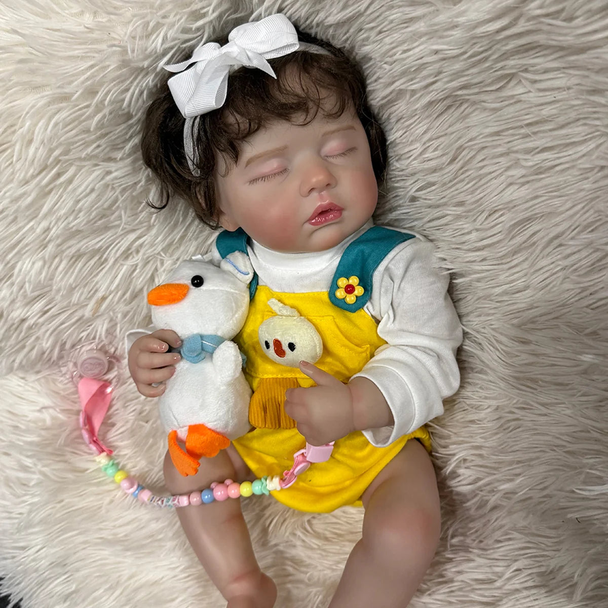 Boneca Bebê Reborn Silicone Realista 48cm Menina Olho fechado Pode dar Banho Brastoy