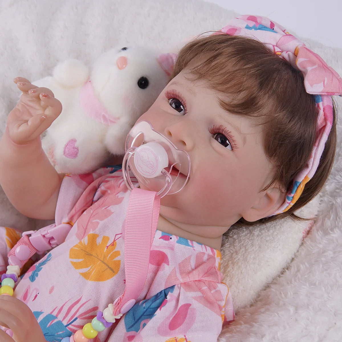 Bebê Reborn Menina Silicone 48cm Boneca Olhos Castanhos Pode dar Banho Brastoy Com Acessórios