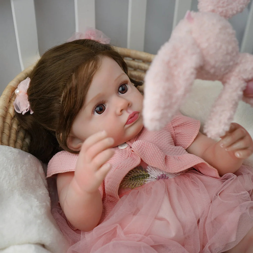 Boneca Bebê Reborn Silicone 55cm Menina Olho Castanho Vestido rosa com Acessórios Brastoy