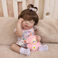 Boneca Bebê Reborn Silicone 48cm Menina Olho Fechado Rosa Pode dar Banho com Acessórios Brastoy