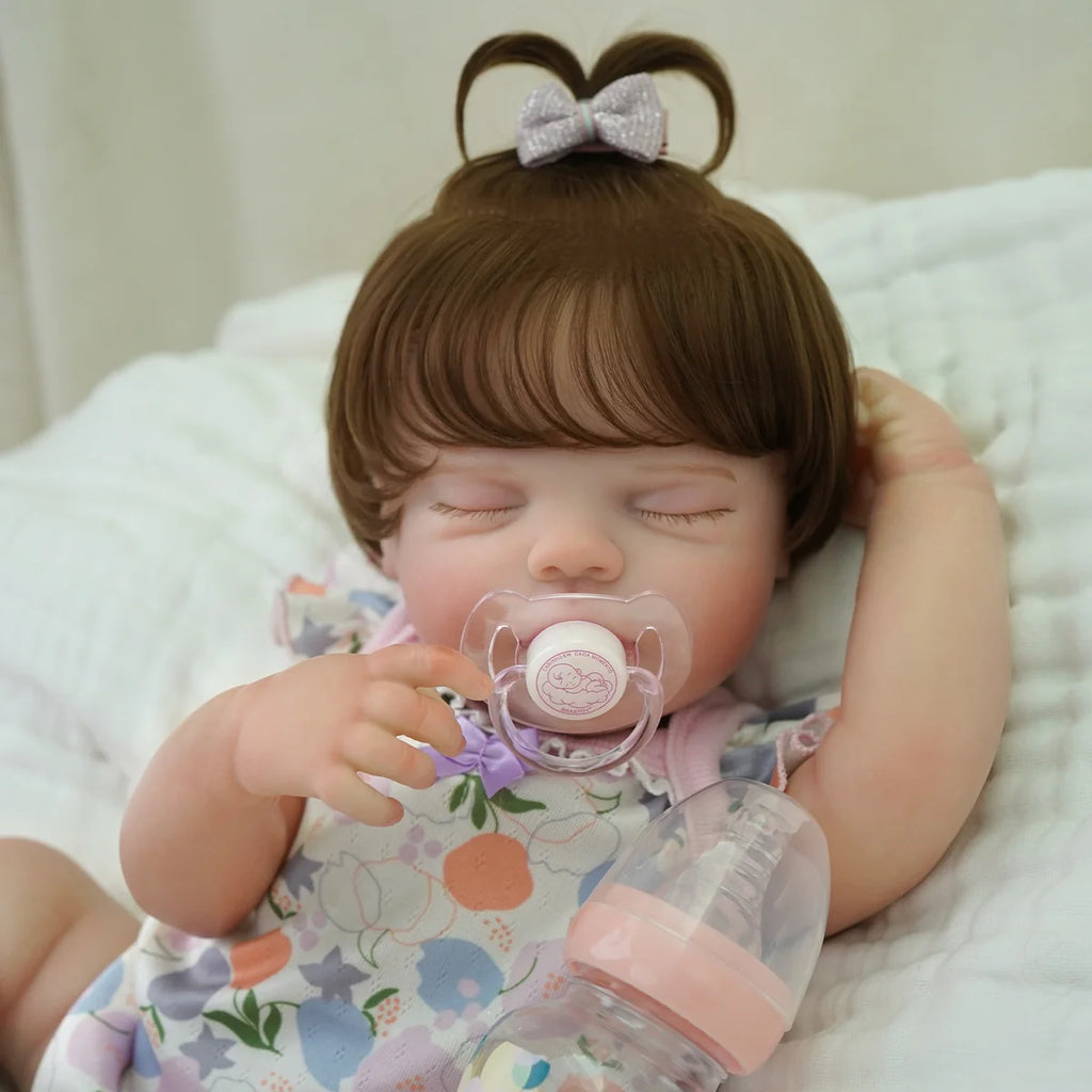 Boneca Bebê Reborn Silicone 48cm Menina Olho Fechado Rosa Pode dar Banho com Acessórios Brastoy