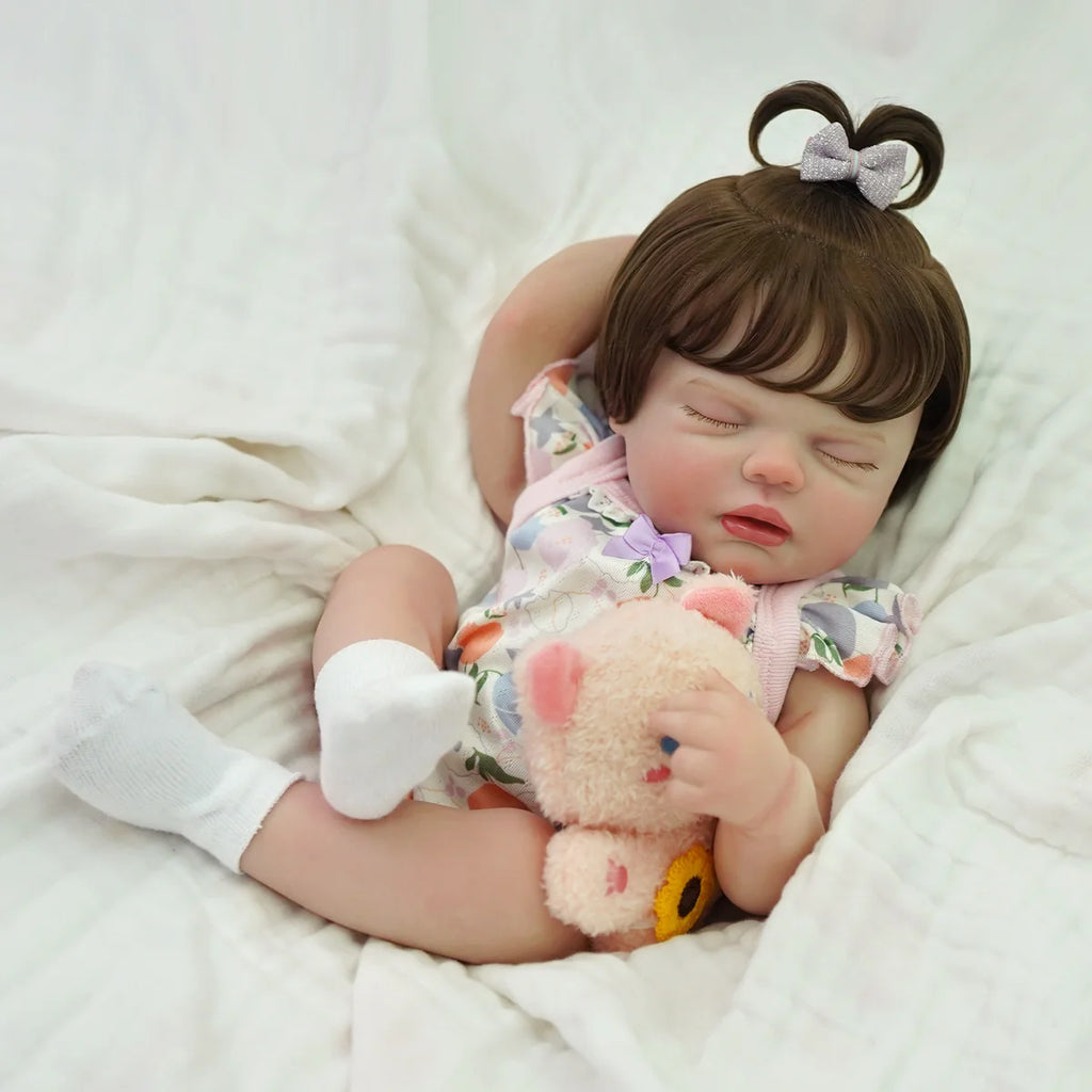 Boneca Bebê Reborn Silicone 48cm Menina Olho Fechado Rosa Pode dar Banho com Acessórios Brastoy
