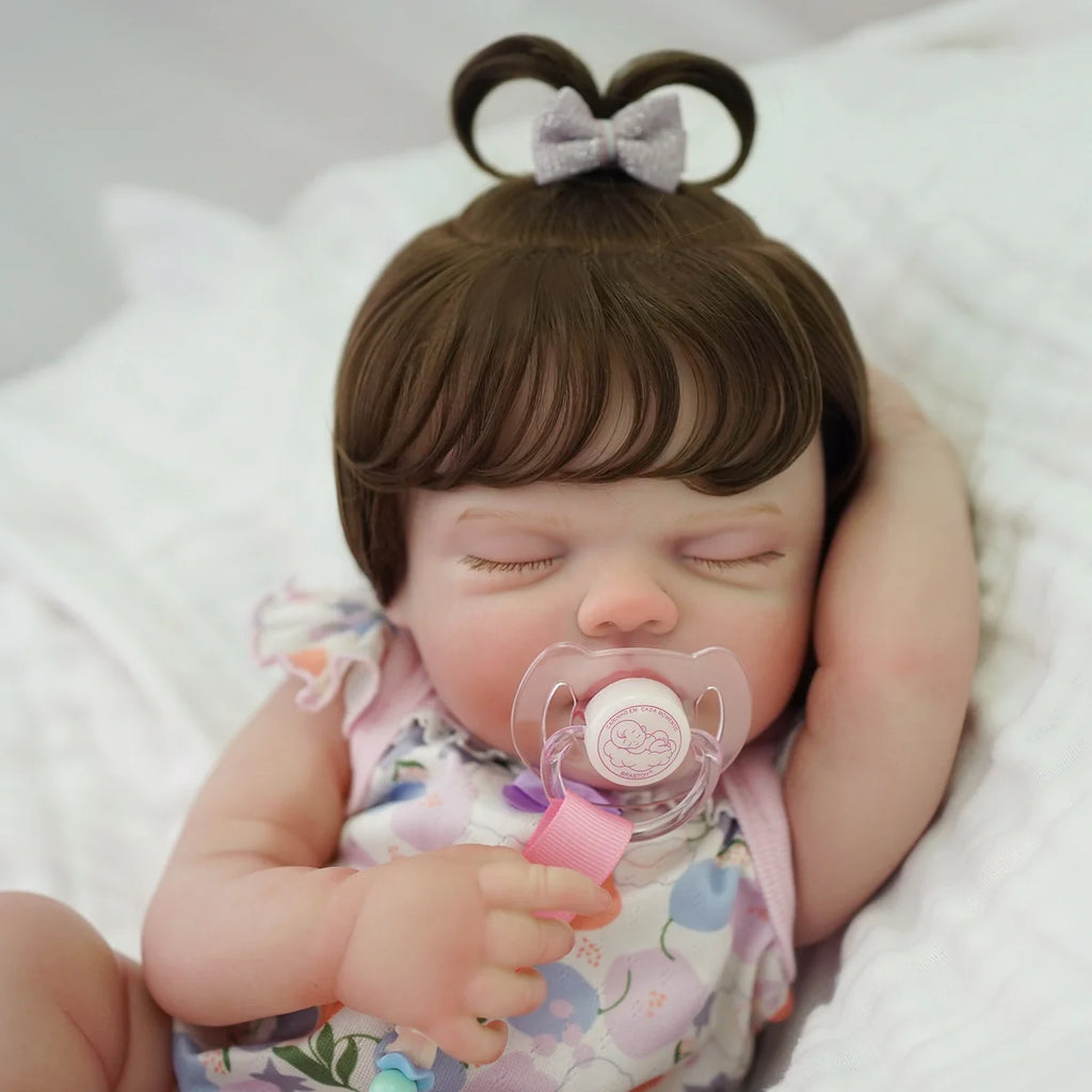 Boneca Bebê Reborn Silicone 48cm Menina Olho Fechado Rosa Pode dar Banho com Acessórios Brastoy