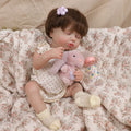 Boneca Bebê Reborn 48cm Silicone Menina Realista Olho Fechado com Acessórios Pode dar Banho Brastoy
