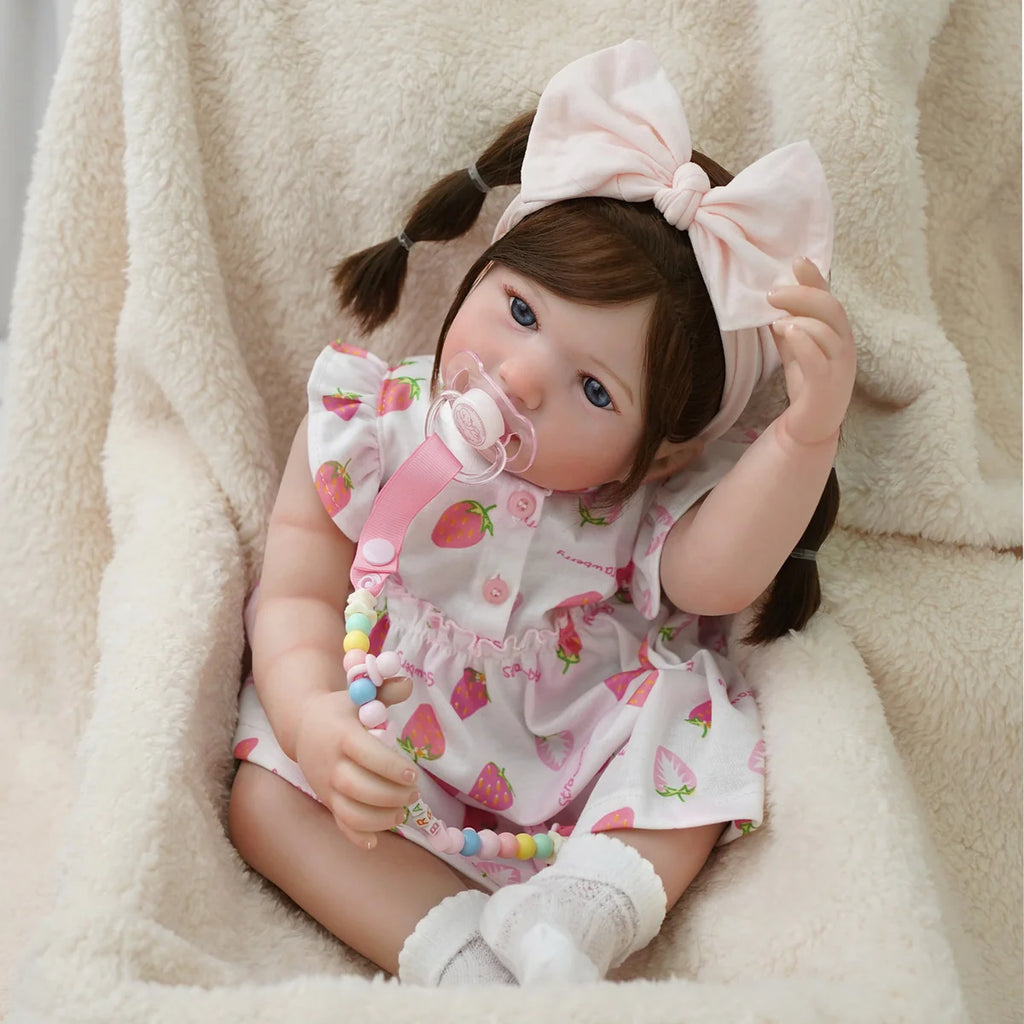 Boneca Bebê Reborn Menina 55cm Silicone Olho Azul com Acessórios Brastoy