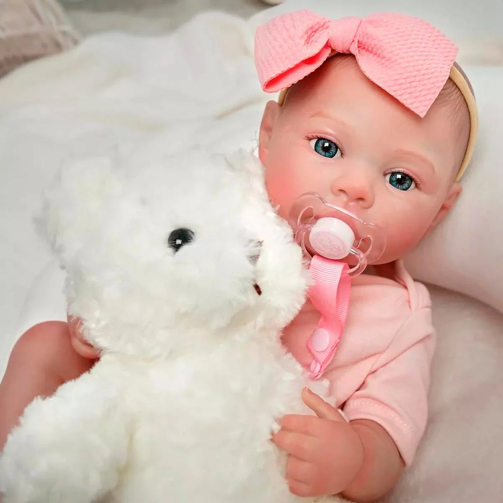 Boneca Bebê Reborn Realista Brastoy Silicone Kit Conjunto de Roupa Chupeta Mamadeira e Pelúcia Menina