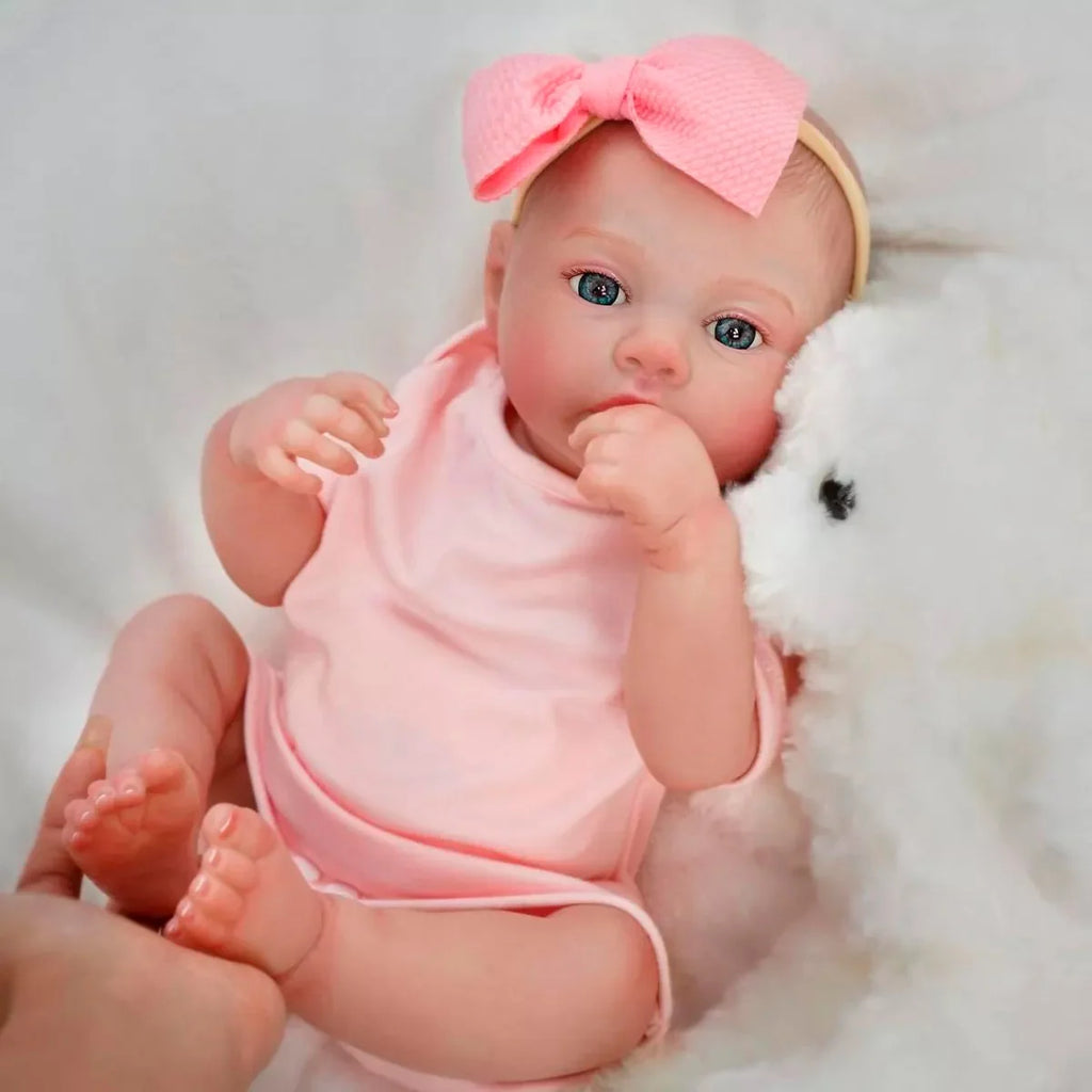 Boneca Bebê Reborn Realista Brastoy Silicone Kit Conjunto de Roupa Chupeta Mamadeira e Pelúcia Menina