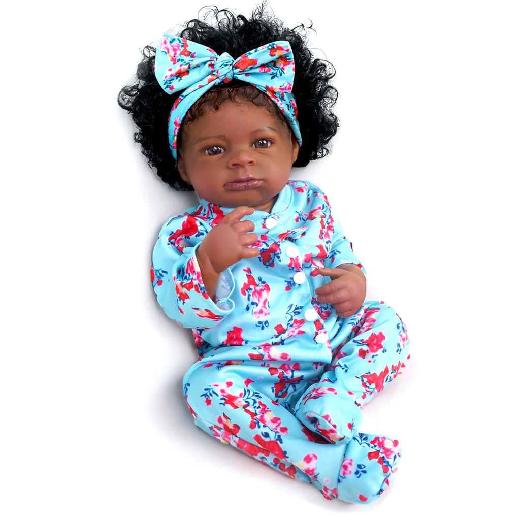Boneca Bebê Reborn Realista Negra 55cm Silicone Conjunto de Roupa Chupeta Mamadeira e Pelúcia Original Completo